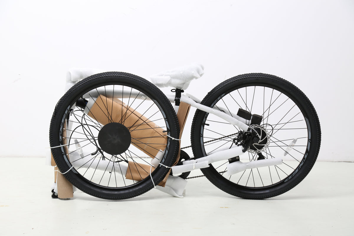 Trail shown with protective packaging and its detached front wheel.