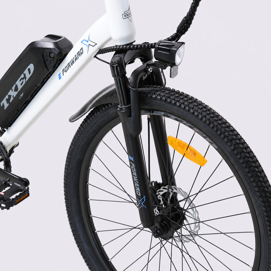 White TXED Trail electric bike - front fork